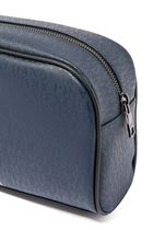 حقيبة مستحضرات العناية الشخصية بشعار الماركة وحجم مناسب للسفر
